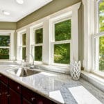 Gorgeous white replacement windows in home kitchen.