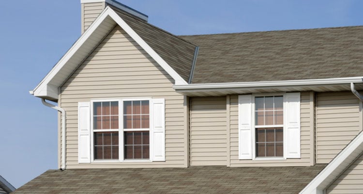 If you require a shot of a new home or any of the array of building products shown, this would be a great image for you. It shows, architectural asphalt shingle roof, vinyl siding, windows, vinyl shutters, seamless aluminum gutters.