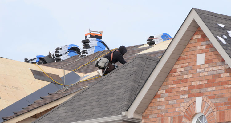 View of Roofers Working for one of the Roofing Companies in Pleasant Ridge MI