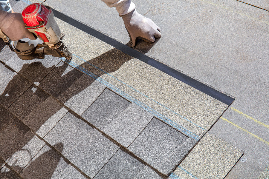 Roofing Shingles Being Installed