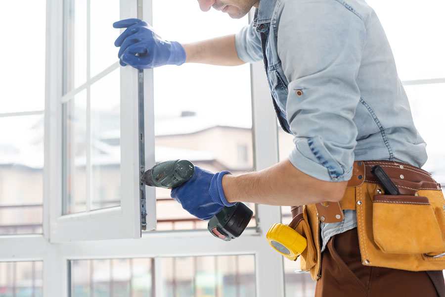 Contractor replacing windows